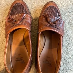 Allen Edmonds tassel loafers.
